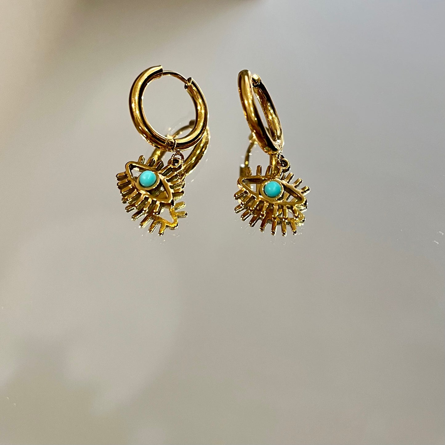 Gold plated stainless steel waterproof eye earrings