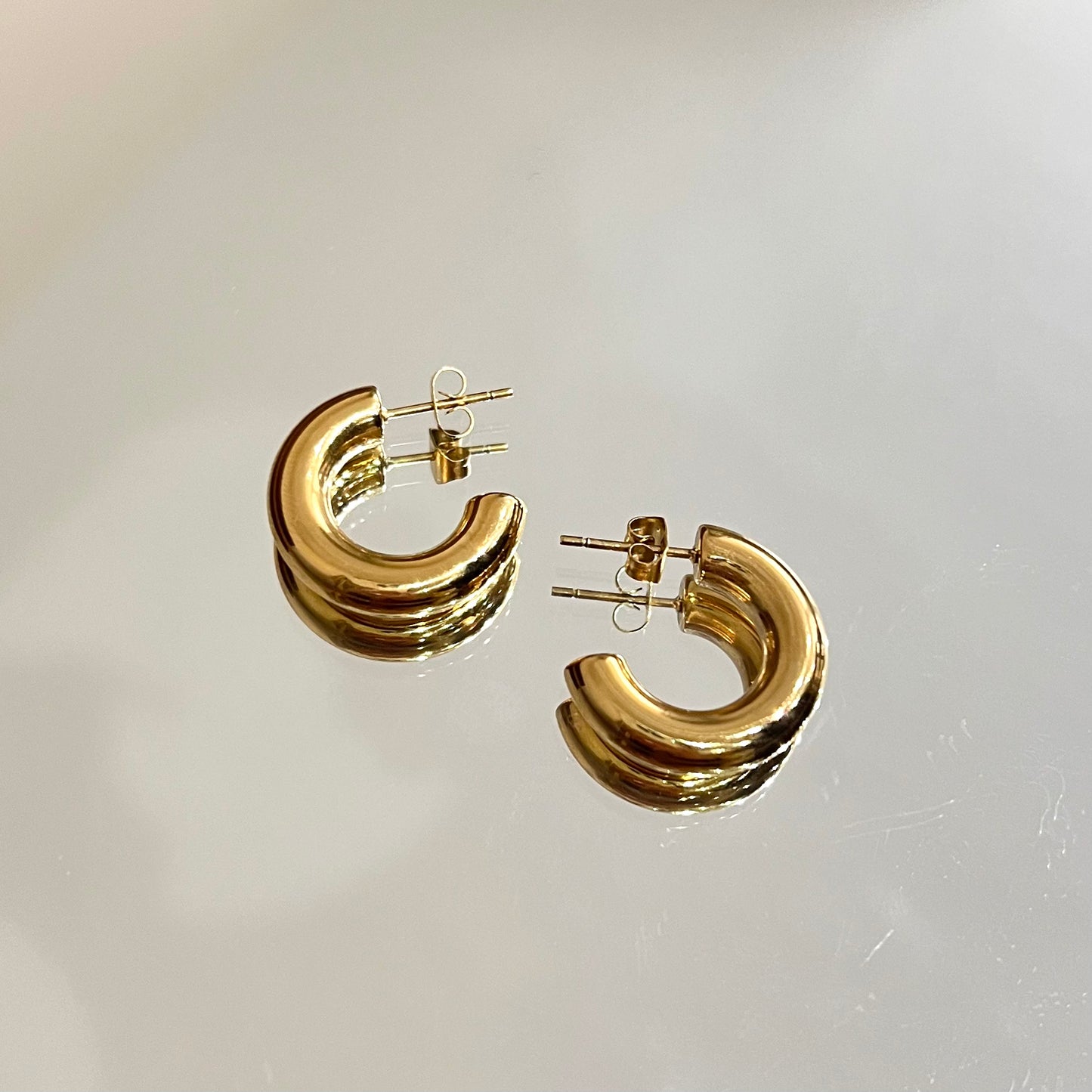 Solid gold-plated huggie hoop earrings